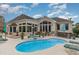 Beautiful backyard with a pool, hot tub, brick patio, and outdoor seating area at 3100 Lahinch Dr., Myrtle Beach, SC 29579