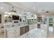 Open kitchen showcasing marble countertops, stainless appliances, and plenty of cabinetry at 3100 Lahinch Dr., Myrtle Beach, SC 29579