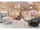 Spacious media room with comfortable seating, movie posters, and ceiling-mounted projector for entertainment at 3100 Lahinch Dr., Myrtle Beach, SC 29579