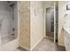 A quaint bathroom featuring a shower/tub and patterned wallpaper is ready for residents and guests at 321 Jay St., Murrells Inlet, SC 29576