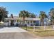 Beautiful one-story home with blue siding, a covered carport, and a fenced yard at 321 Jay St., Murrells Inlet, SC 29576