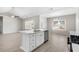 A kitchen island features hard surface countertop, modern sink and stainless steel dishwasher at 351 Lakota Loop, Longs, SC 29568