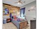 Unique bedroom features a rustic wood accent wall and fun decor at 3600 White Wing Circle, Myrtle Beach, SC 29579
