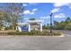 Community entrance sign for Clear Pond by Heritage Homes and Toll Brothers under a sunny sky at 3600 White Wing Circle, Myrtle Beach, SC 29579