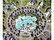 Aerial view of a resort-style pool with many features and landscaping at 410 Starlit Way, Myrtle Beach, SC 29579
