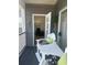 Cozy balcony seating area with outdoor access to the living room at 4519 N Plantation Harbour Dr. # X - 19, Little River, SC 29566
