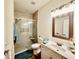 Bathroom boasts a tile shower with glass door and modern vanity at 4519 N Plantation Harbour Dr. # X - 19, Little River, SC 29566