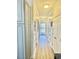 Neutral hallway with wood flooring and doors to bedrooms or bathrooms at 4519 N Plantation Harbour Dr. # X - 19, Little River, SC 29566