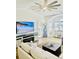 Bright living room with a ceiling fan, a flatscreen TV, and comfortable sofa seating at 4519 N Plantation Harbour Dr. # X - 19, Little River, SC 29566