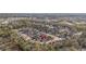 Aerial view shows home in established neighborhood, surrounded by trees, and near amenities at 453 Saint Charles Circle, Myrtle Beach, SC 29588
