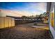 This backyard features a fire pit, storage shed, patio and wooden fence creating a private retreat at 453 Saint Charles Circle, Myrtle Beach, SC 29588