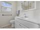 Bathroom with a large vanity, updated lighting, and tile flooring at 453 Saint Charles Circle, Myrtle Beach, SC 29588