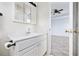 Bathroom sink with upgraded fixtures and view into an adjacent bedroom at 453 Saint Charles Circle, Myrtle Beach, SC 29588