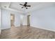 Bright main bedroom with laminate flooring leads to bathroom and walk-in closet at 453 Saint Charles Circle, Myrtle Beach, SC 29588