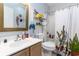 Bathroom with mirror, sink, toilet, shelf and bathtub at 4584 Lomax Ct. # 1B, Murrells Inlet, SC 29576