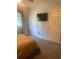 Bedroom features TV and closet doors at 4584 Lomax Ct. # 1B, Murrells Inlet, SC 29576