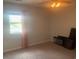 Bright bedroom with carpet, ceiling fan, and natural light from the window at 4584 Lomax Ct. # 1B, Murrells Inlet, SC 29576