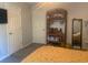 Bedroom features TV, closet, and decorative shelving at 4584 Lomax Ct. # 1B, Murrells Inlet, SC 29576