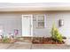 A cozy front entrance with small garden at 4584 Lomax Ct. # 1B, Murrells Inlet, SC 29576