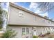 Two-story townhome featuring a cozy front entrance with a decorative wreath at 4584 Lomax Ct. # 1B, Murrells Inlet, SC 29576