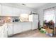 Bright kitchen with white cabinets at 4584 Lomax Ct. # 1B, Murrells Inlet, SC 29576
