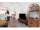 Comfortable living room featuring a sleek TV and a stylish display cabinet at 4584 Lomax Ct. # 1B, Murrells Inlet, SC 29576