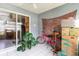 Cozy sun room with sliding glass door, decor, and potted plants at 4584 Lomax Ct. # 1B, Murrells Inlet, SC 29576
