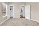 Spacious bedroom with ensuite bathroom, walk-in closet, and a window with natural light at 4936 Crab Pond Ct. # 201, Myrtle Beach, SC 29579