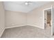 Large bedroom with carpeted floors, vaulted ceilings, and a ceiling fan at 4936 Crab Pond Ct. # 201, Myrtle Beach, SC 29579