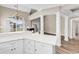 Open floor plan featuring kitchen with white cabinetry, large countertops and eat-in area at 4936 Crab Pond Ct. # 201, Myrtle Beach, SC 29579