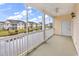 Inviting screened patio with a ceiling fan, overlooking the beautiful pond at 4936 Crab Pond Ct. # 201, Myrtle Beach, SC 29579