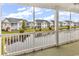 Charming patio overlooking a picturesque pond and well-maintained grounds at 4936 Crab Pond Ct. # 201, Myrtle Beach, SC 29579