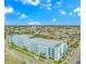 Aerial view of a condominium with a bright blue facade and views of the city at 504 N Ocean Blvd. # 310, Myrtle Beach, SC 29577