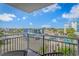 Balcony view overlooking the city street with a building in the background on a sunny day at 504 N Ocean Blvd. # 310, Myrtle Beach, SC 29577