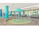 Indoor pool featuring central fountain, lounge seating, tiled floor, and bright, open space at 504 N Ocean Blvd. # 310, Myrtle Beach, SC 29577