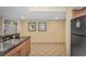 Bright kitchen boasts granite countertops, stainless steel sink, and adjacent space for dining or storage at 504 N Ocean Blvd. # 310, Myrtle Beach, SC 29577