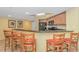 Open kitchen with granite countertops, stainless steel appliances, breakfast bar, and convenient access at 504 N Ocean Blvd. # 310, Myrtle Beach, SC 29577