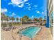 Resort style pool and lounging area with ocean views on a sunny day with blue skies and white clouds at 504 N Ocean Blvd. # 310, Myrtle Beach, SC 29577