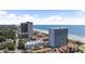 Beautiful aerial view of high-rise condos, beach, and ocean views at 5511 N Ocean Blvd. # 202, Myrtle Beach, SC 29577