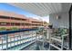 Relaxing balcony with seating overlooking the pool area at 5511 N Ocean Blvd. # 202, Myrtle Beach, SC 29577