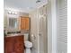 Well-maintained bathroom featuring a wood vanity and modern fixtures at 5511 N Ocean Blvd. # 202, Myrtle Beach, SC 29577