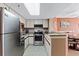 Well-equipped kitchen with stainless steel appliances, granite countertops, and ample cabinet space at 5511 N Ocean Blvd. # 202, Myrtle Beach, SC 29577
