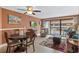 Comfortable living room with dining area, plush seating, and a sliding glass door to the balcony at 5511 N Ocean Blvd. # 202, Myrtle Beach, SC 29577