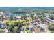 Stunning aerial view of a residential community near a lake, featuring lush landscaping at 556 Timber Creek Dr., Loris, SC 29569