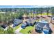 Aerial view of a home showcasing a well-manicured lawn, mature trees, and desirable neighborhood at 556 Timber Creek Dr., Loris, SC 29569