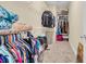 Walk in closet featuring shelving and hanging racks for optimal storage of clothes and belongings at 556 Timber Creek Dr., Loris, SC 29569