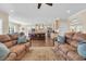 Open floor plan living room view to kitchen, hardwood floors, and comfortable seating at 556 Timber Creek Dr., Loris, SC 29569