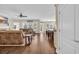 Spacious living area featuring hardwood floors and seamless flow into the dining and kitchen areas at 556 Timber Creek Dr., Loris, SC 29569