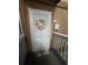 Inviting condo front door with a charming nautical welcome wreath and decor, setting a welcoming tone at 5601 N Ocean Blvd. # E-111, Myrtle Beach, SC 29577