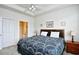 Bedroom with ceiling fan, neutral decor and ensuite bathroom access at 5750 Oyster Catcher Dr. # 1034, North Myrtle Beach, SC 29582
